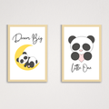 prints with panda illustrations and text on a white wall.